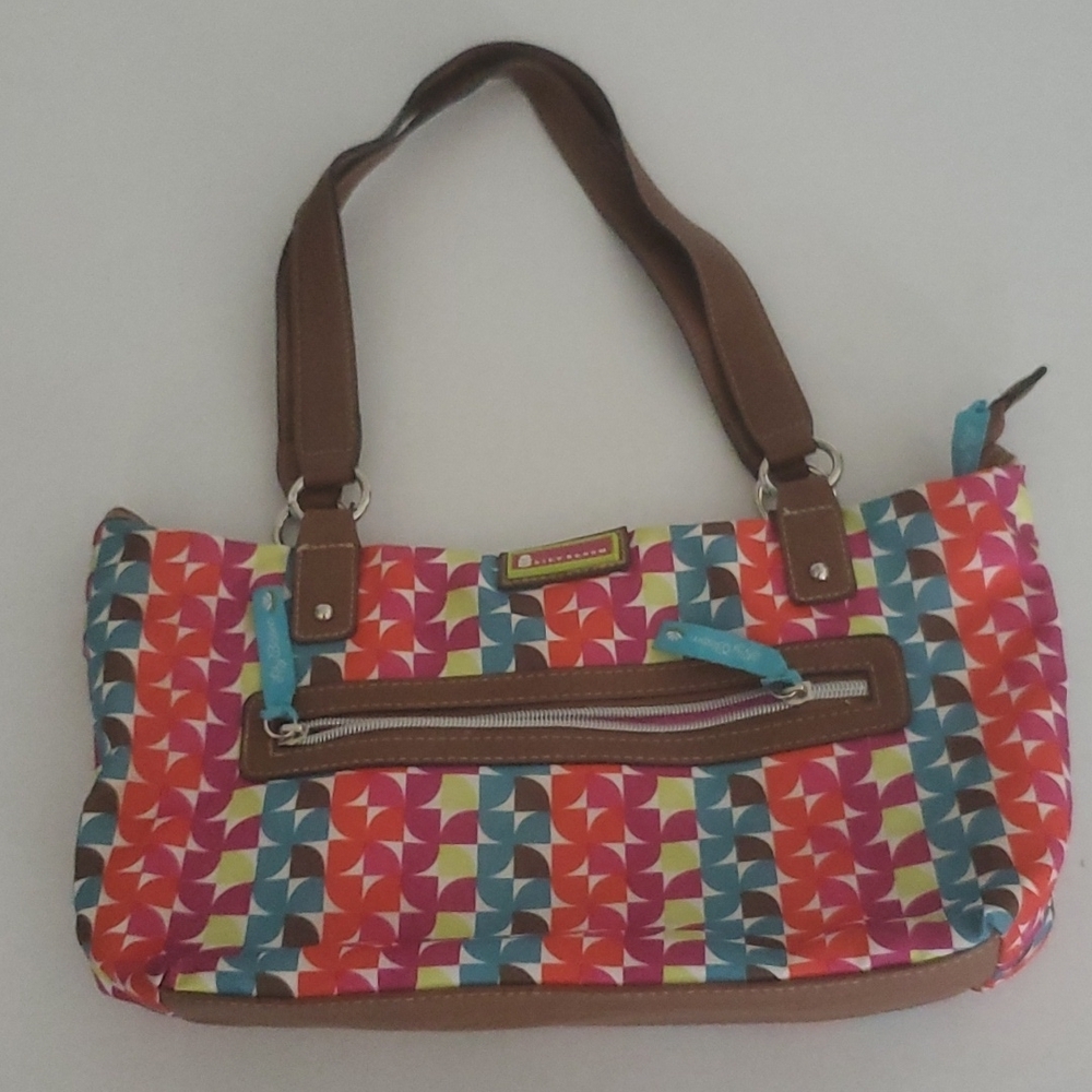 Lily Bloom nylon purse. 3 pockets inside. Some pen marks in lining.
